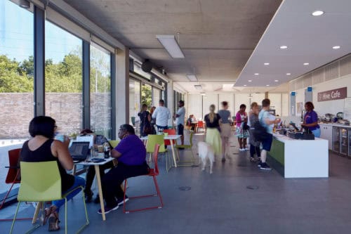 People at the busy Sense Cafe inside Sense TouchBase Pears.