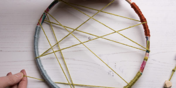 Making the web of a dream catcher with string