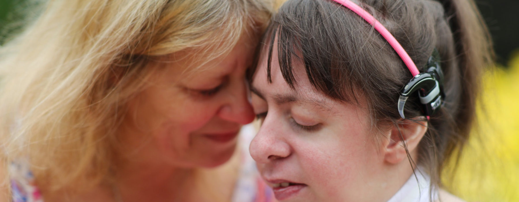 Nicola Slator and her daughter Rebecca Slator, 20, who is deaf, autistic and wears a tracheostomy.