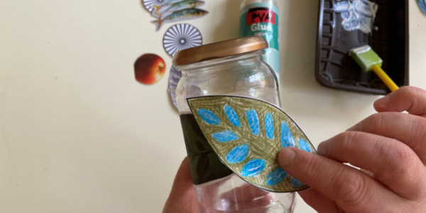 Applying a leaf to the side of a jar
