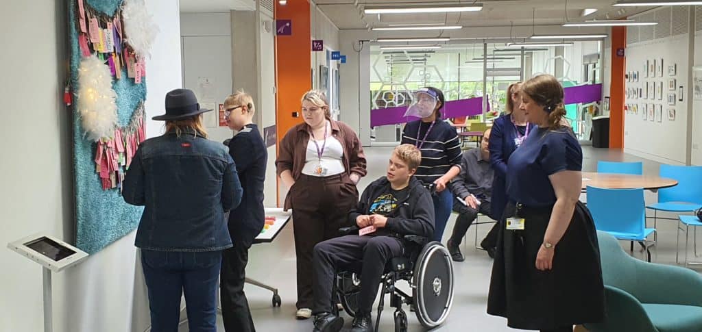 Visitors to the Haptic Hones Exhibition at TouchBase Pears