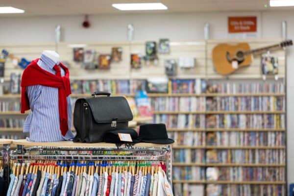 Clothes, books and a guitar available to buy in a Sense shop
