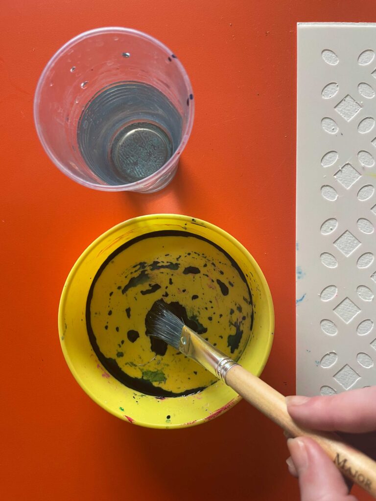Adding water to the food colouring