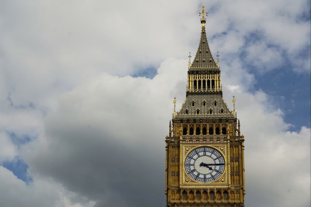 The top of the Elizabeth Tower at Westminster (nicknamed Big Ben) against a cloudy sky